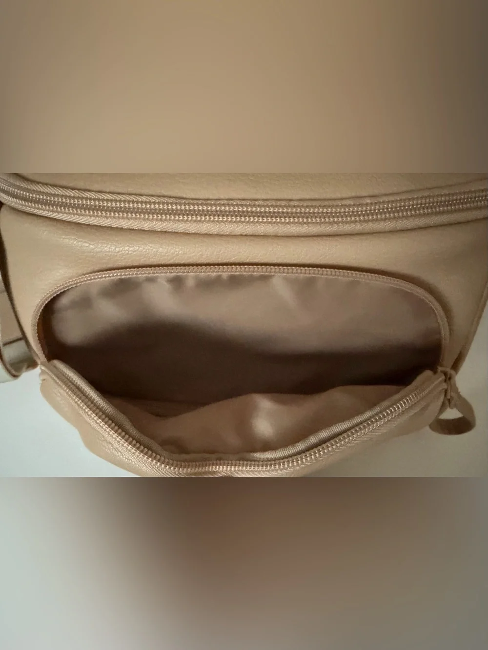 Cloud Island diaper sling in tan with checkered strap